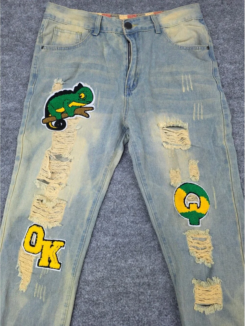 Distressed Light Blue Denim Jeans with Colorful Patches, Size 34